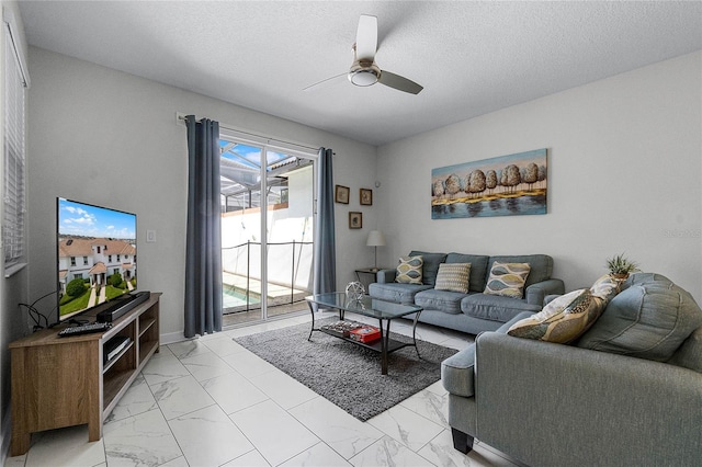 1566 Plunker Dr, Davenport, FL 33896 - living area featuring a textured ceiling, a ceiling fan, and marble finish floor