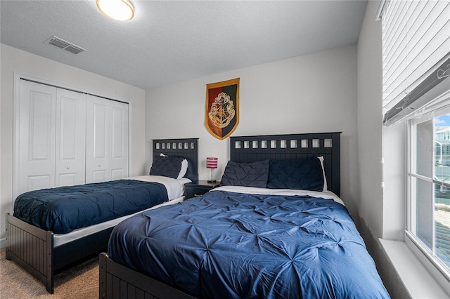 1566 Plunker Dr, Davenport, FL 33896 - bedroom with carpet, visible vents, and a closet