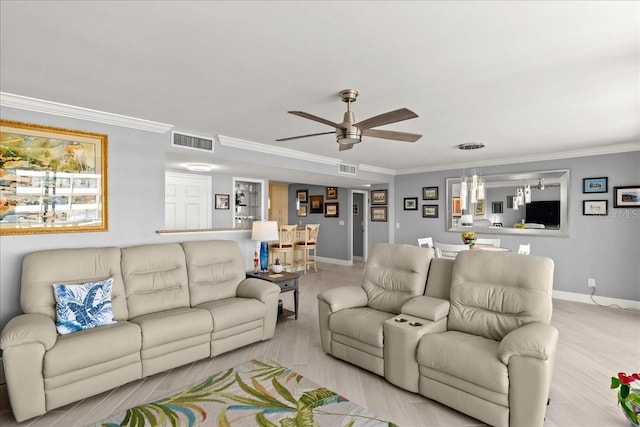 2828 N Atlantic Ave Unit 1903, Daytona Beach, FL 32118 - living area featuring light wood-style floors, ceiling fan, ornamental molding, visible vents, and baseboards