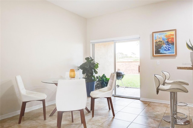 2934 Rodrick Cir, Orlando, FL 32824 - dining area featuring a wealth of natural light, baseboards, and light tile patterned floors