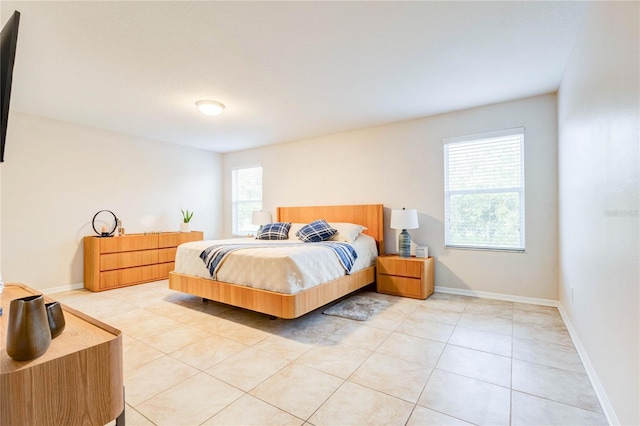 2934 Rodrick Cir, Orlando, FL 32824 - bedroom featuring light tile patterned flooring and baseboards