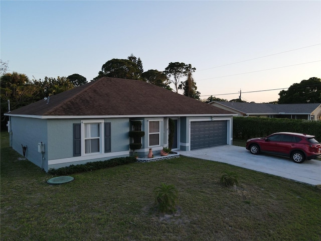282 SE Walsh Ter, Port St Lucie, FL 34983 - ranch-style home with concrete driveway, a shingled roof, a garage, and a front yard
