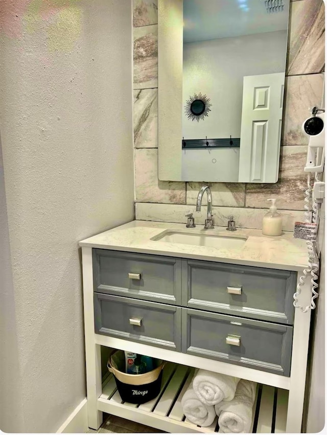 1122 Spaceport Ct, Kissimmee, FL 34741 - bathroom featuring vanity and baseboards