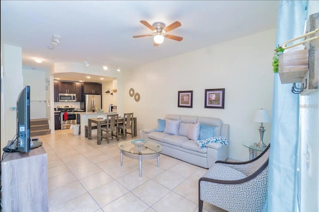 2610 Lodi Cir Unit 104, Kissimmee, FL 34746 - living area with light tile patterned flooring and ceiling fan