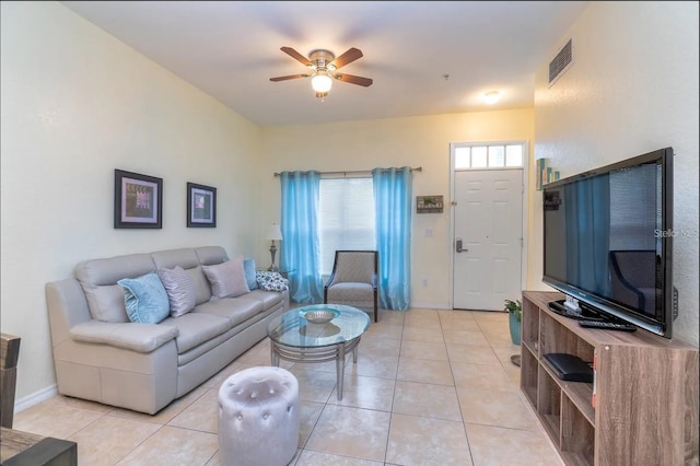2610 Lodi Cir Unit 104, Kissimmee, FL 34746 - living area featuring ceiling fan and light tile patterned floors
