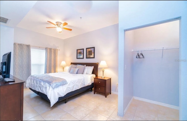 2610 Lodi Cir Unit 104, Kissimmee, FL 34746 - bedroom featuring light tile patterned floors and a ceiling fan