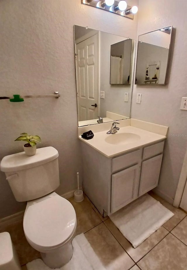 2610 Lodi Cir Unit 104, Kissimmee, FL 34746 - bathroom featuring vanity and tile patterned flooring