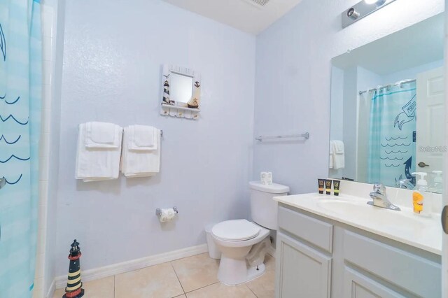 2610 Lodi Cir Unit 104, Kissimmee, FL 34746 - full bathroom featuring vanity, tile patterned flooring, and a shower with curtain
