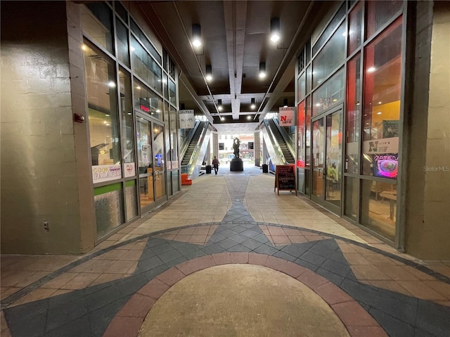 hallway featuring tile patterned flooring