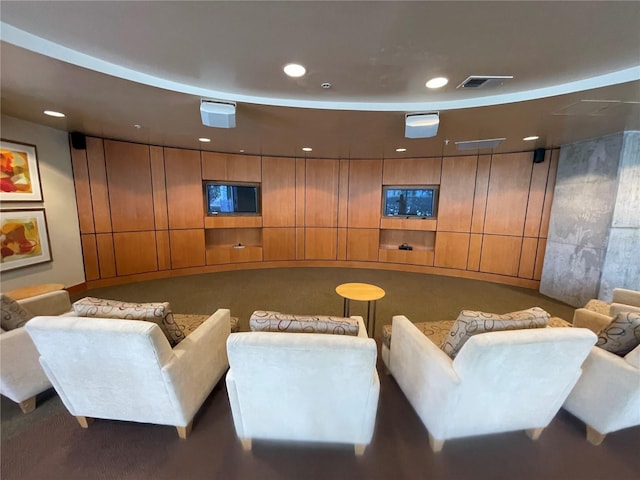 living room featuring recessed lighting and visible vents