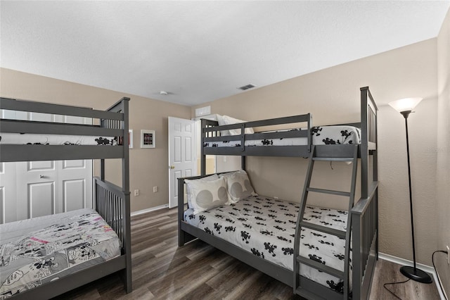 5101 Staniard Dr, Kissimmee, FL 34746 - bedroom featuring visible vents, baseboards, and wood finished floors