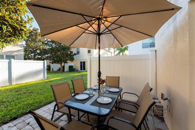 5101 Staniard Dr, Kissimmee, FL 34746 - view of patio featuring fence and outdoor dining area