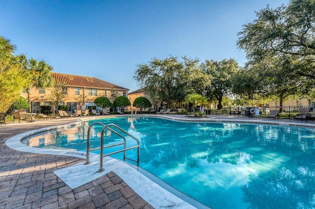 5101 Staniard Dr, Kissimmee, FL 34746 - pool with a patio area and fence