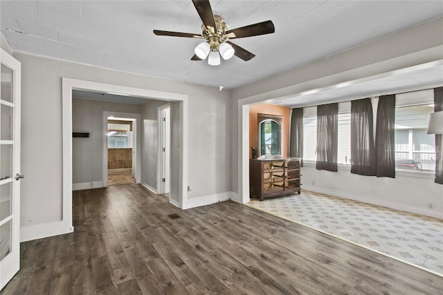 514 Massachusetts Ave, Saint Cloud, FL 34769 - empty room with baseboards, wood finished floors, and a ceiling fan
