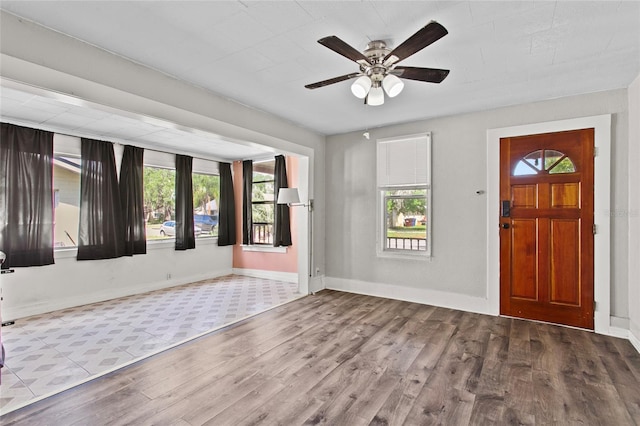 514 Massachusetts Ave, Saint Cloud, FL 34769 - foyer entrance featuring baseboards, wood finished floors, and a ceiling fan