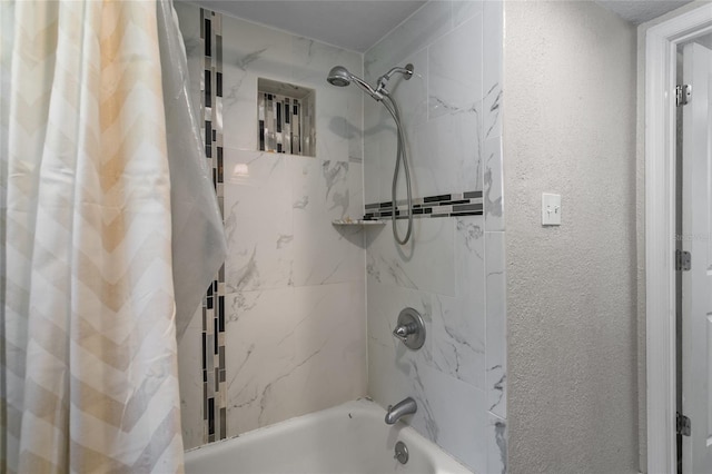 514 Massachusetts Ave, Saint Cloud, FL 34769 - full bath with a textured wall and shower / bathtub combination with curtain