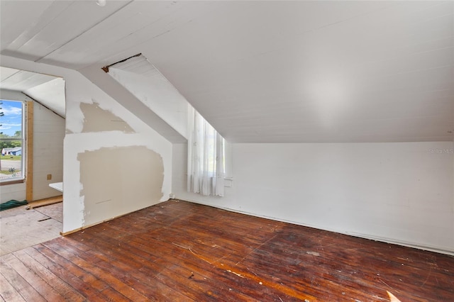514 Massachusetts Ave, Saint Cloud, FL 34769 - bonus room featuring lofted ceiling and hardwood / wood-style flooring