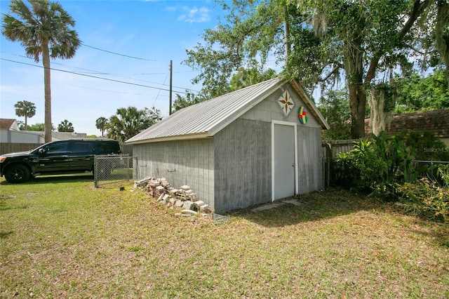 514 Massachusetts Ave, Saint Cloud, FL 34769 - view of shed featuring fence
