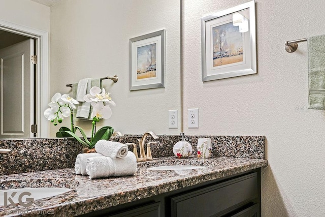 9075 Dogleg Dr, Davenport, FL 33896 - bathroom featuring double vanity and a sink