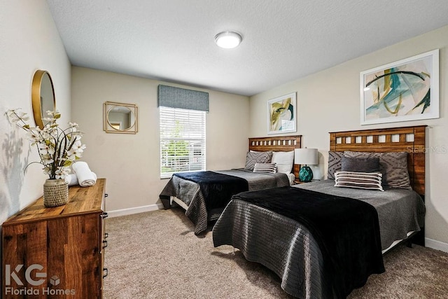 9075 Dogleg Dr, Davenport, FL 33896 - carpeted bedroom featuring a textured ceiling and baseboards