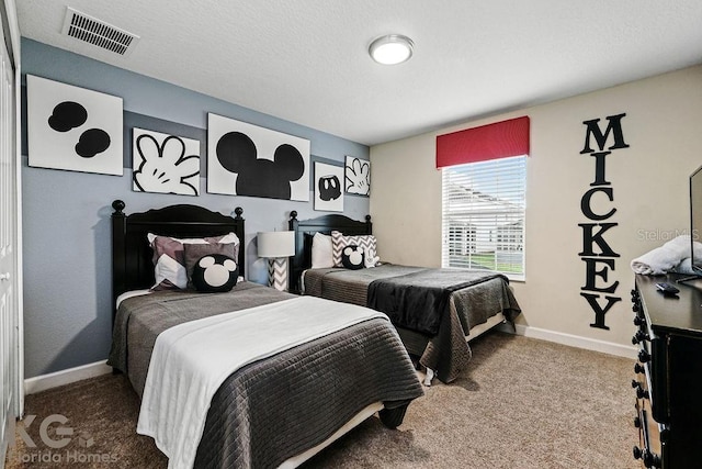 9075 Dogleg Dr, Davenport, FL 33896 - carpeted bedroom featuring a textured ceiling, baseboards, and visible vents