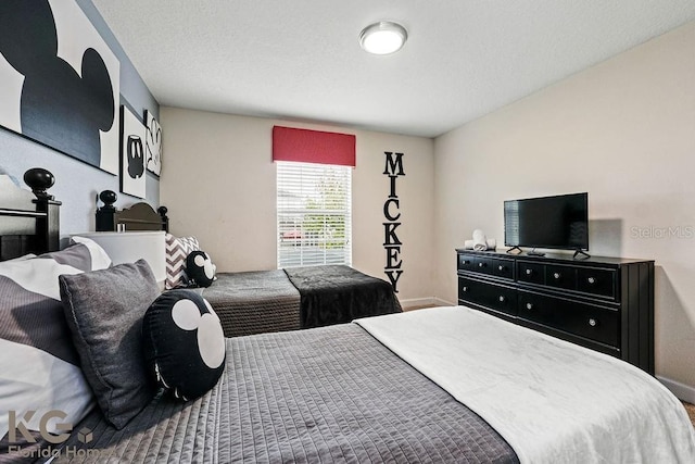 9075 Dogleg Dr, Davenport, FL 33896 - bedroom with a textured ceiling