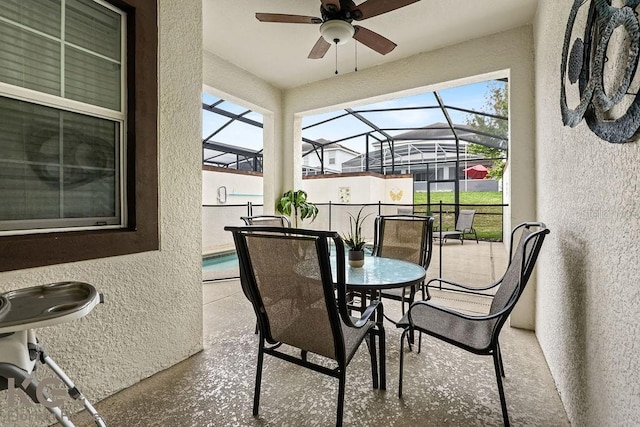 9075 Dogleg Dr, Davenport, FL 33896 - sunroom / solarium featuring outdoor dining space and ceiling fan