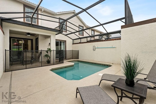 9075 Dogleg Dr, Davenport, FL 33896 - view of pool featuring a fenced in pool, a patio area, a lanai, and a ceiling fan