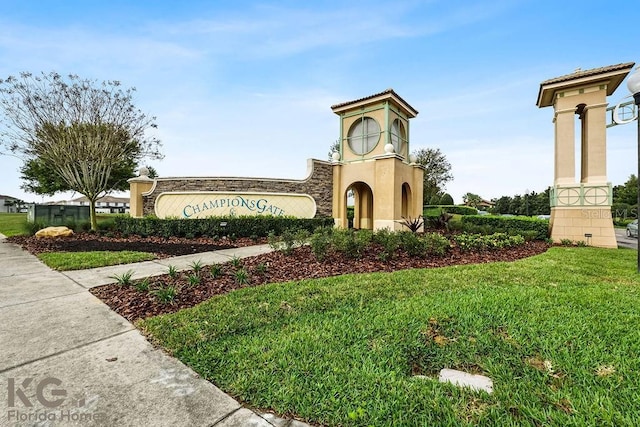 9075 Dogleg Dr, Davenport, FL 33896 - community sign featuring a lawn