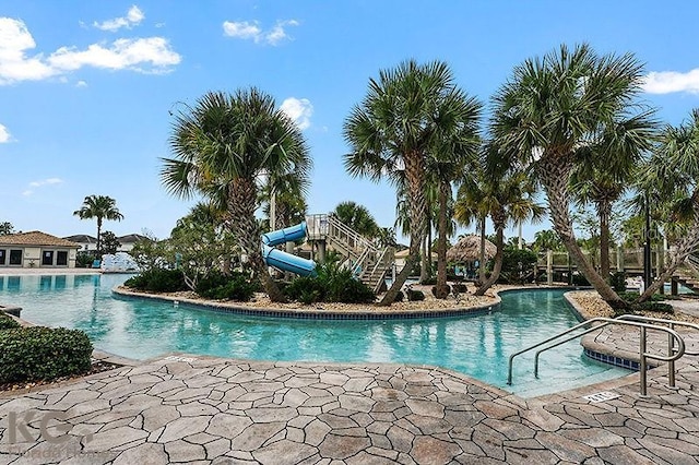 9075 Dogleg Dr, Davenport, FL 33896 - pool with a patio area