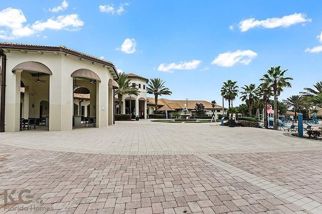 9075 Dogleg Dr, Davenport, FL 33896 - view of community with a patio