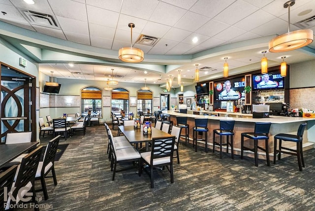 9075 Dogleg Dr, Davenport, FL 33896 - dining area featuring visible vents and carpet