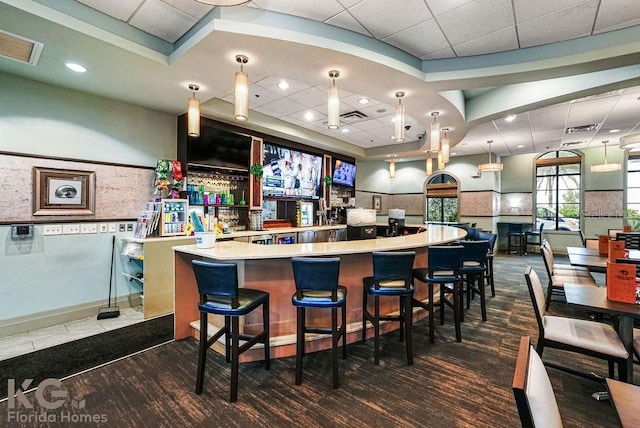 9075 Dogleg Dr, Davenport, FL 33896 - bar featuring a drop ceiling, visible vents, and hanging light fixtures