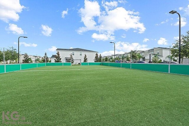 9075 Dogleg Dr, Davenport, FL 33896 - view of sport court featuring fence