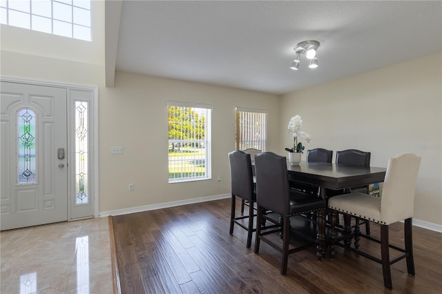 7716 Park Hill Ave, Leesburg, FL 34748 - dining area with baseboards and wood finished floors