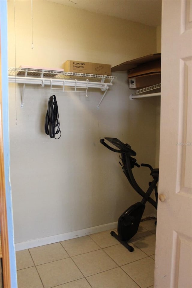 walk in closet featuring light tile patterned floors