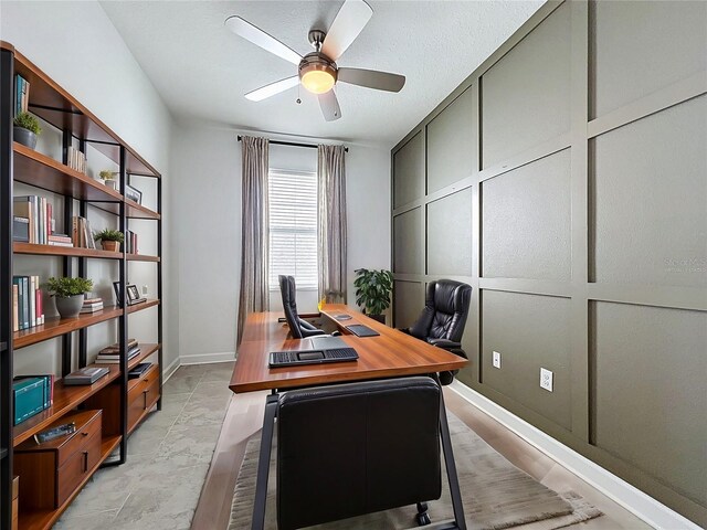 195 Preston Ave, Davenport, FL 33837 - office area with a ceiling fan and baseboards