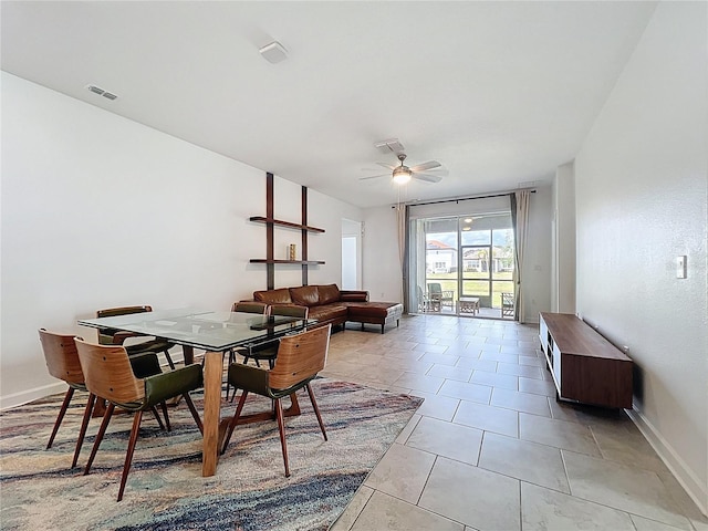 195 Preston Ave, Davenport, FL 33837 - dining area with light tile patterned floors, a ceiling fan, visible vents, and baseboards