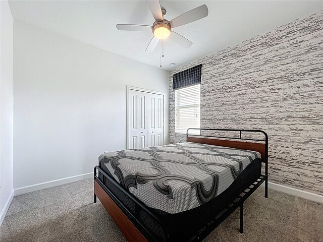 195 Preston Ave, Davenport, FL 33837 - bedroom featuring baseboards, ceiling fan, a closet, and carpet flooring