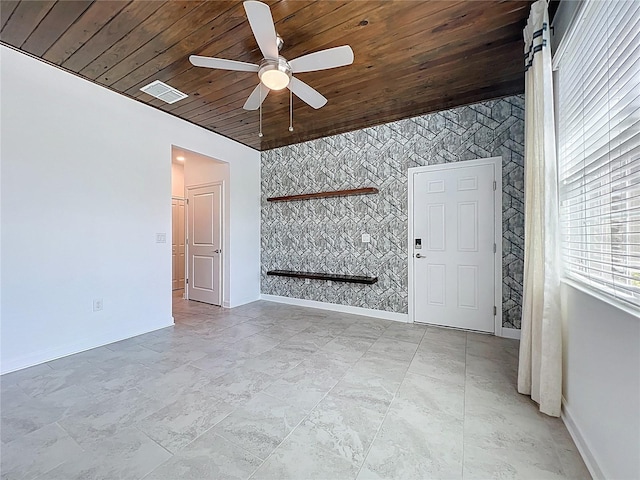 195 Preston Ave, Davenport, FL 33837 - unfurnished room featuring wooden ceiling, a ceiling fan, visible vents, baseboards, and an accent wall
