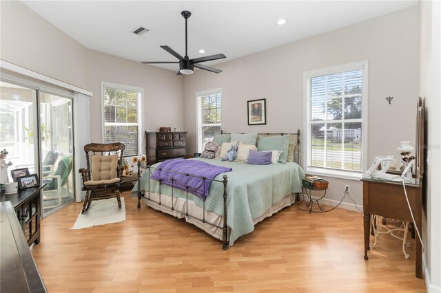 1730 King Henry Dr, Kissimmee, FL 34744 - bedroom with access to exterior, baseboards, visible vents, light wood-style floors, and recessed lighting