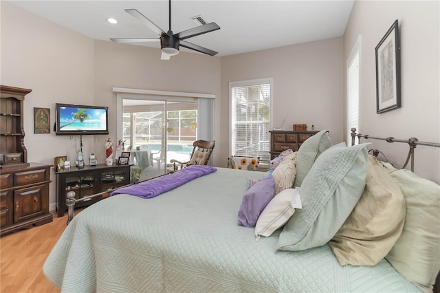 1730 King Henry Dr, Kissimmee, FL 34744 - bedroom featuring a ceiling fan, light wood finished floors, access to outside, visible vents, and recessed lighting