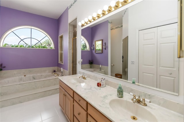 1730 King Henry Dr, Kissimmee, FL 34744 - bathroom with a bath, toilet, tile patterned flooring, and a sink