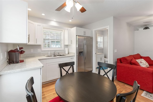 1730 King Henry Dr, Kissimmee, FL 34744 - dining area with light wood-style flooring, recessed lighting, and ceiling fan