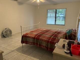 133 Bianca Ct, Kissimmee, FL 34758 - bedroom with tile patterned flooring and ceiling fan