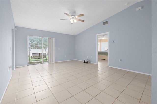 101 Cheltenham Pl, Kissimmee, FL 34758 - unfurnished room featuring light tile patterned flooring, lofted ceiling, visible vents, and a ceiling fan