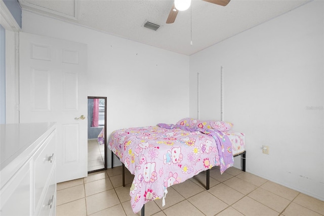 101 Cheltenham Pl, Kissimmee, FL 34758 - bedroom featuring light tile patterned flooring, visible vents, and a ceiling fan