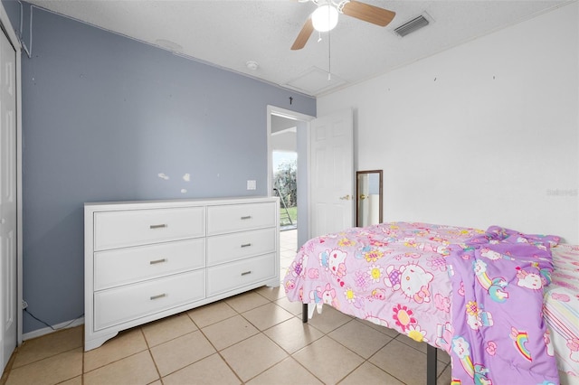 101 Cheltenham Pl, Kissimmee, FL 34758 - bedroom featuring light tile patterned flooring, ceiling fan, and visible vents