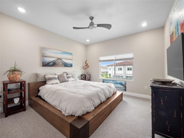 1911 Greenbriar Ter, Davenport, FL 33837 - carpeted bedroom with a textured ceiling, ceiling fan, baseboards, and recessed lighting