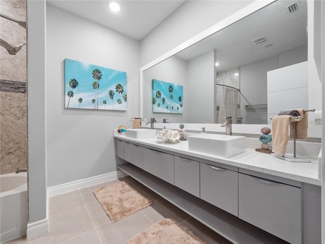 1911 Greenbriar Ter, Davenport, FL 33837 - bathroom featuring double vanity, walk in shower, visible vents, a tub to relax in, and a sink